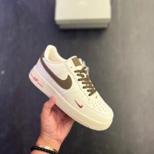 First Copy Nike Air Force 1 White Sneakers with Brown Swoosh